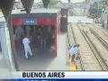Video: Girl Slips Under Train